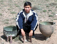 Nikolai Dagaazhik with his finds. Photo by Aldynai Mongush