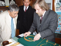 Sherig-ool Oorzhak gets acquainted with the Tuvan Treasures in the Hermitage. Photo by Mergen Lundup