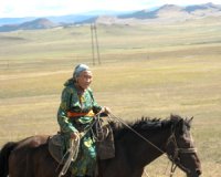 Front veteran Vera Bailak receives a certificate as No.1 sheep herder- thousander