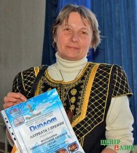 Решением Главы города руководитель ансамбля «Октай» Надежда Пономарева награждена юбилейной медалью