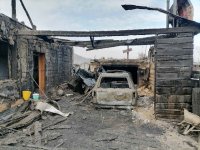 За ночь в поселке Каа-Хем пожар повредил жилой дом со всеми постройками и автомашинами